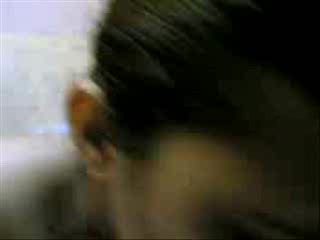 Indian chick sucking her boyfriend's schlong on camera