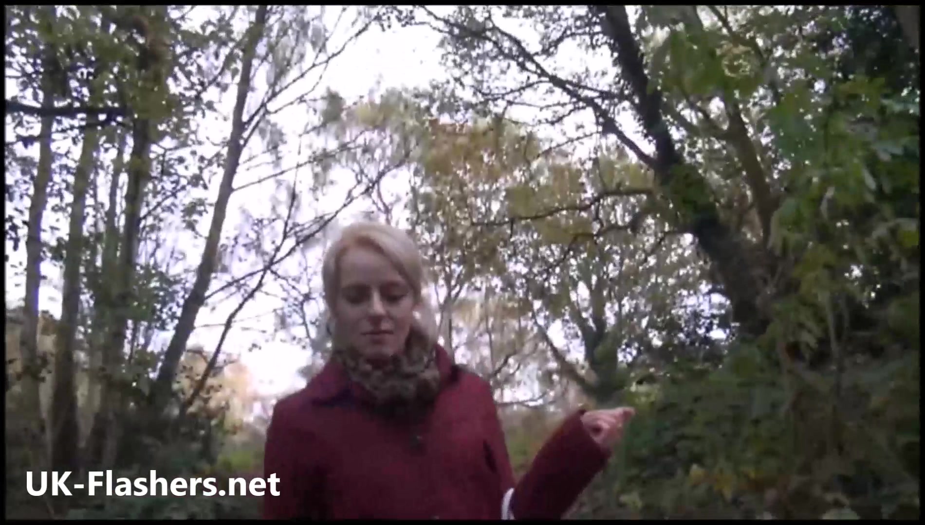 Sexy blonde exhibitionist April strips naked outdoors