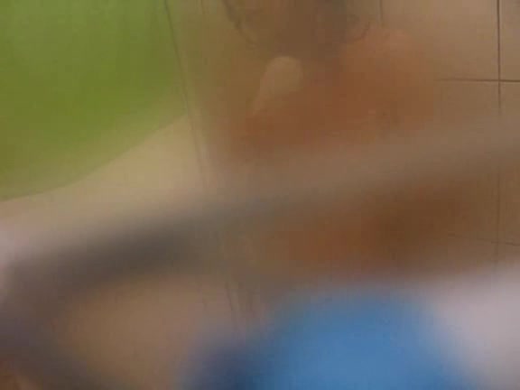 Young Asian babe caught naked in the bathroom by horny