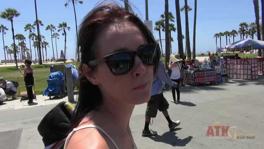 ATKGirlfriends video: Ashley Stone stripping to her bikini and laying in the California sun.