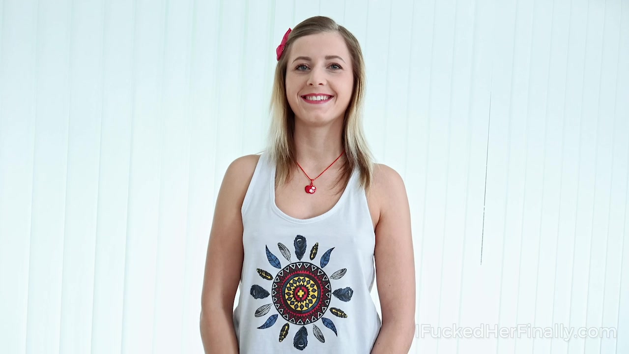 Sexy cutie takes off her clothes on camera in photo studio