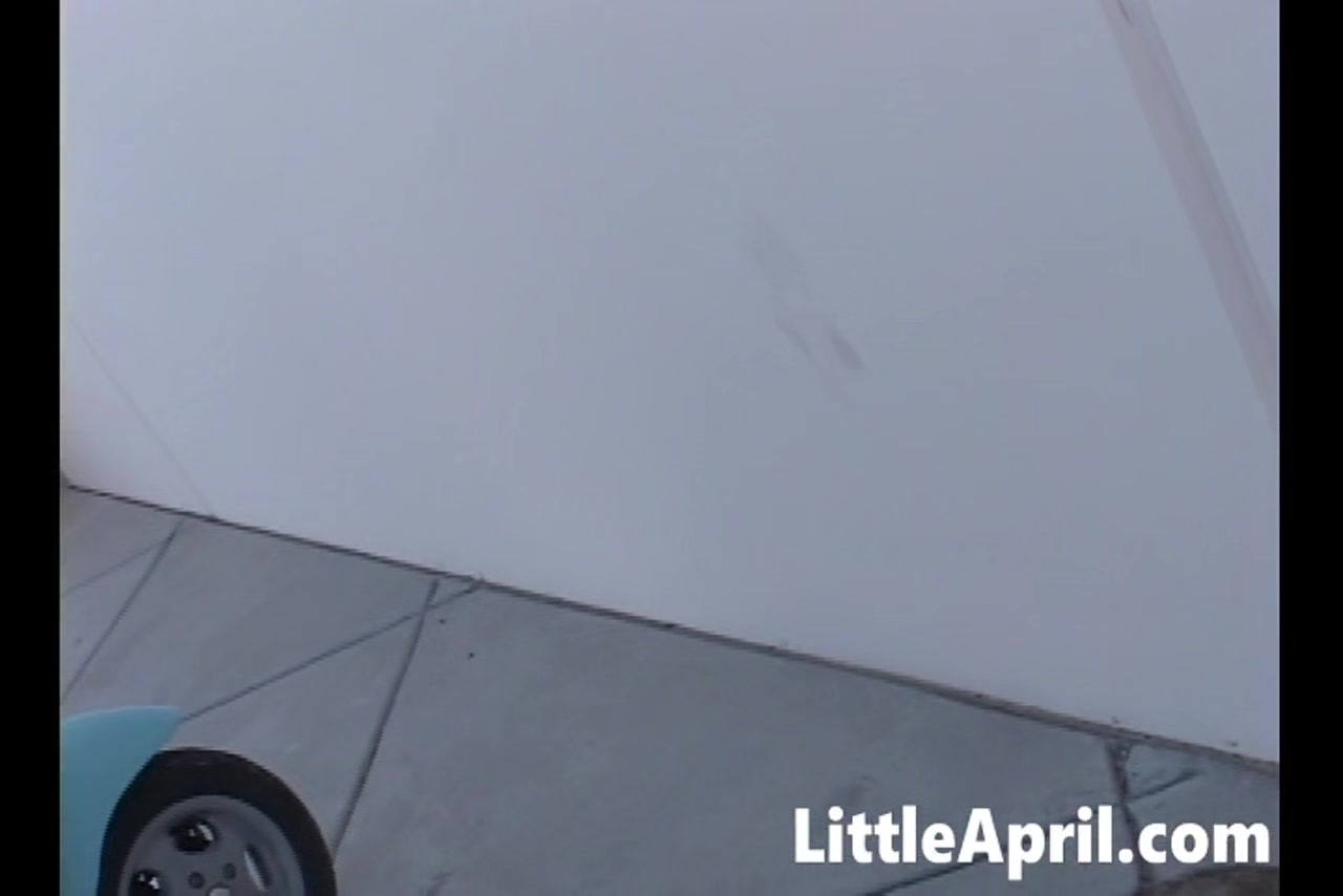 Little April masturbates in hot solo scene