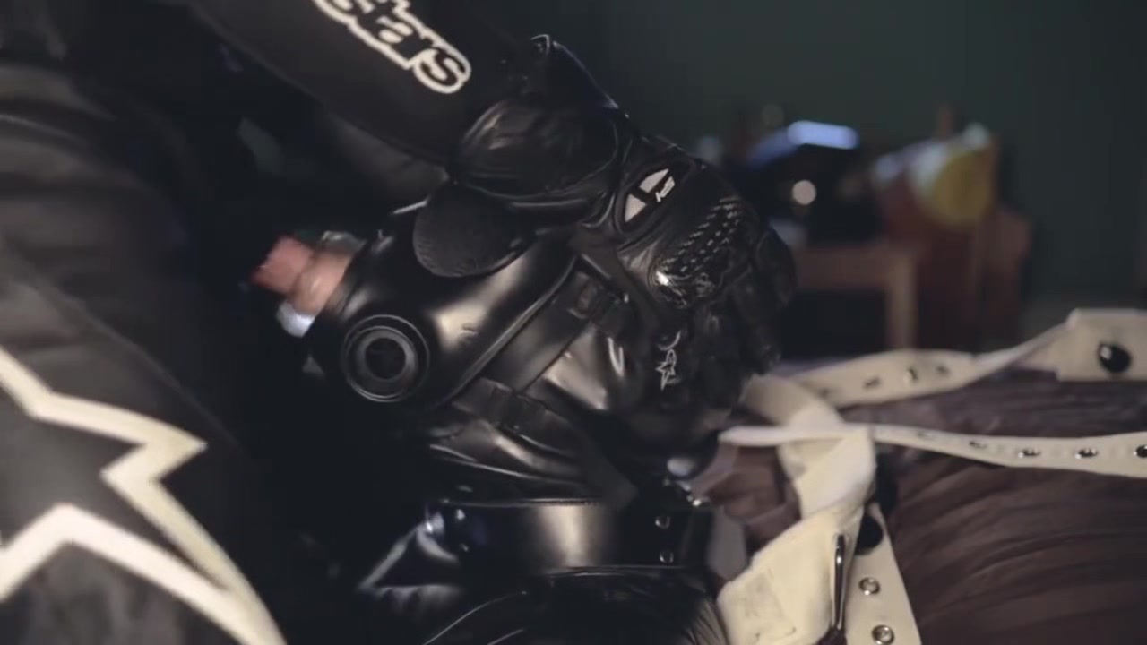 Rubber boy sucking biker master cock