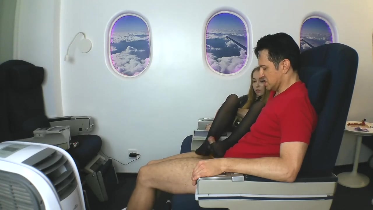 Stewardess gives nylon footjob in plane by Foot Girls