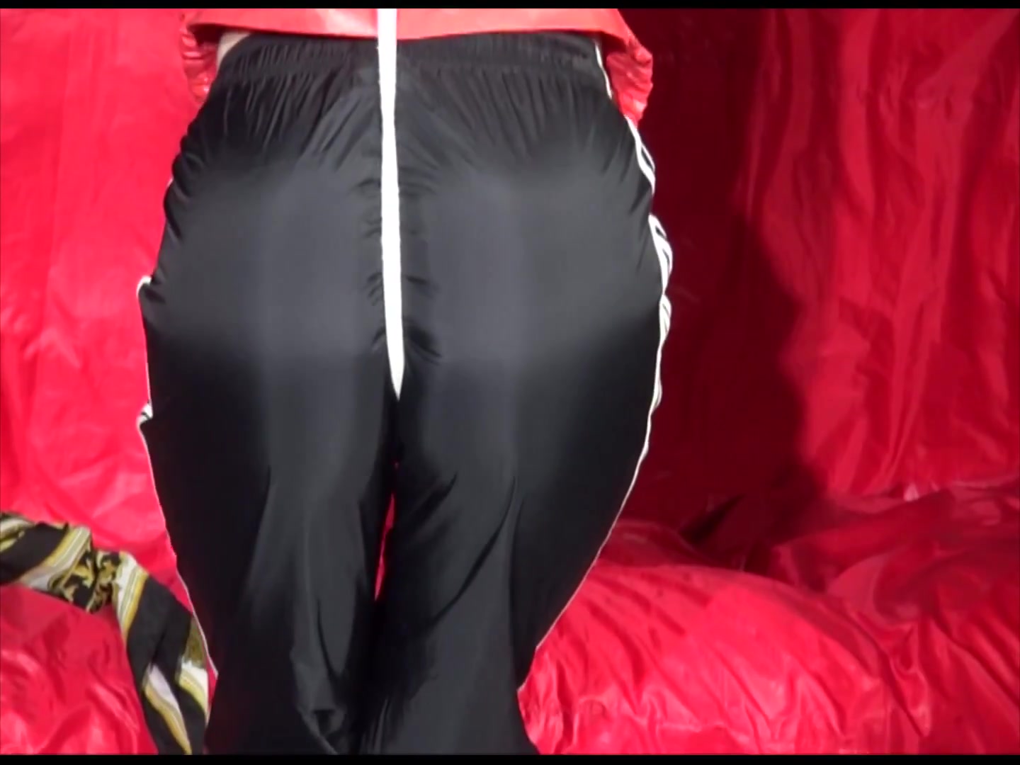 Get 2 Videos With Lucy And Sonja From Our 2011 Archives Enjoying Bondage In Their Shiny Nylon Rainwear