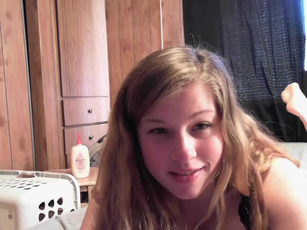 Blonde chick with big tits spreading her pussy lips wide