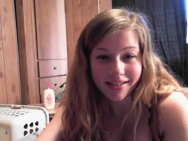 Blonde chick with big tits spreading her pussy lips wide
