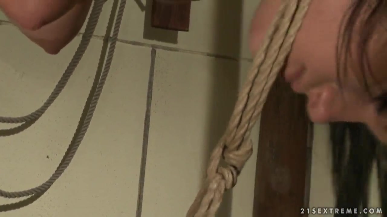 Estella licks Nikky Thorne in bondage action