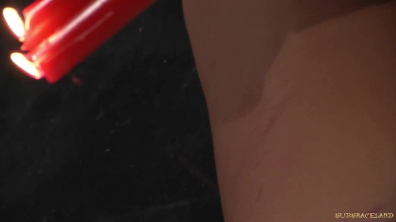 Redhead gets candle wax on her pussy has orgasm in BDSM