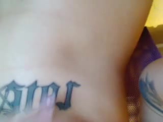 She fucks herself long and deep with a purple dildo