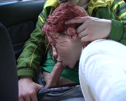 Red-haired doxy engulfing in the car for all to watch