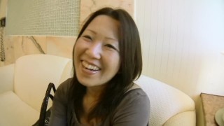 Japanese MILF with nice tits squeezes creampie out of her pussy