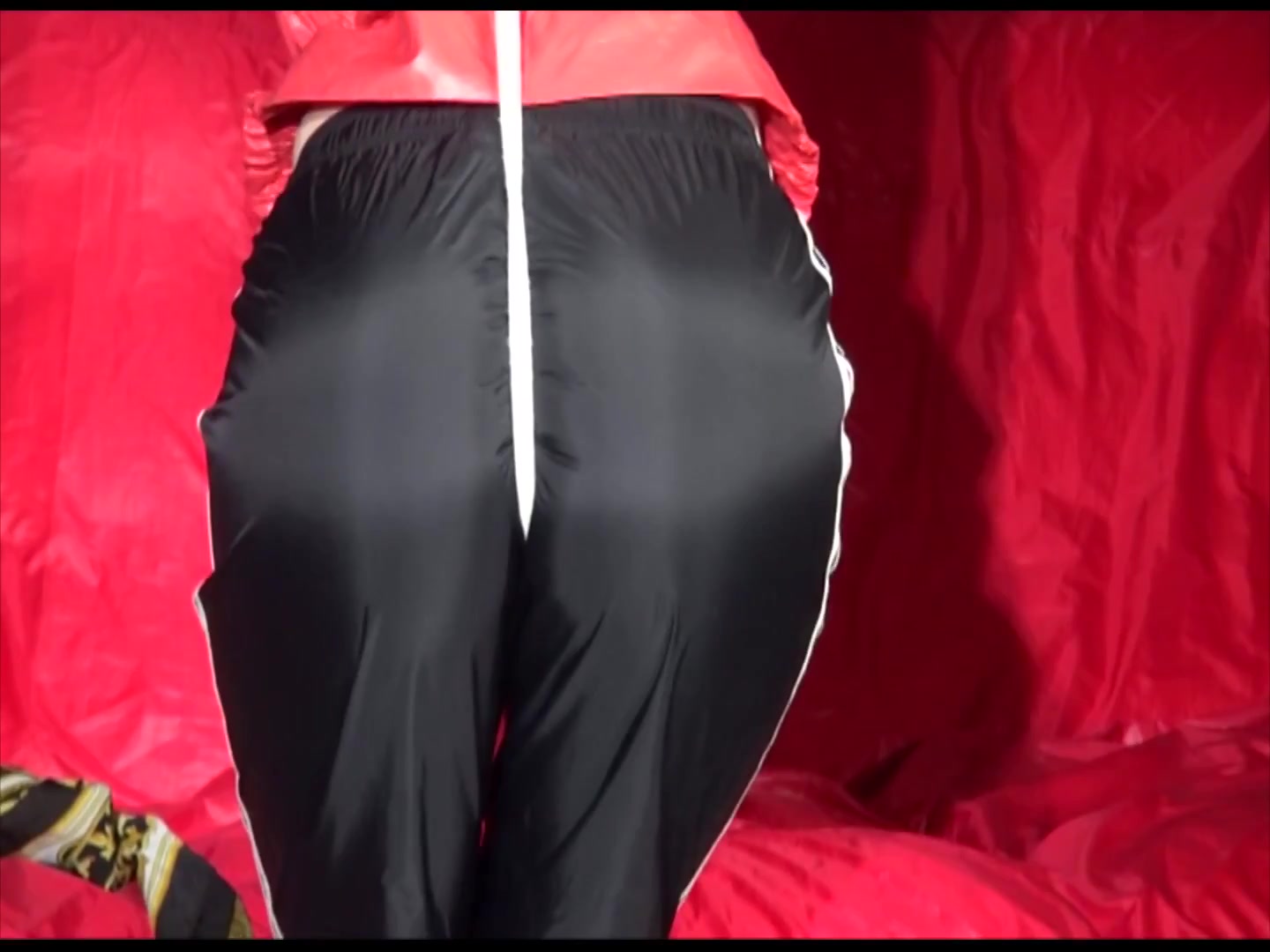 Get 2 Videos With Lucy And Sonja From Our 2011 Archives Enjoying Bondage In Their Shiny Nylon Rainwear