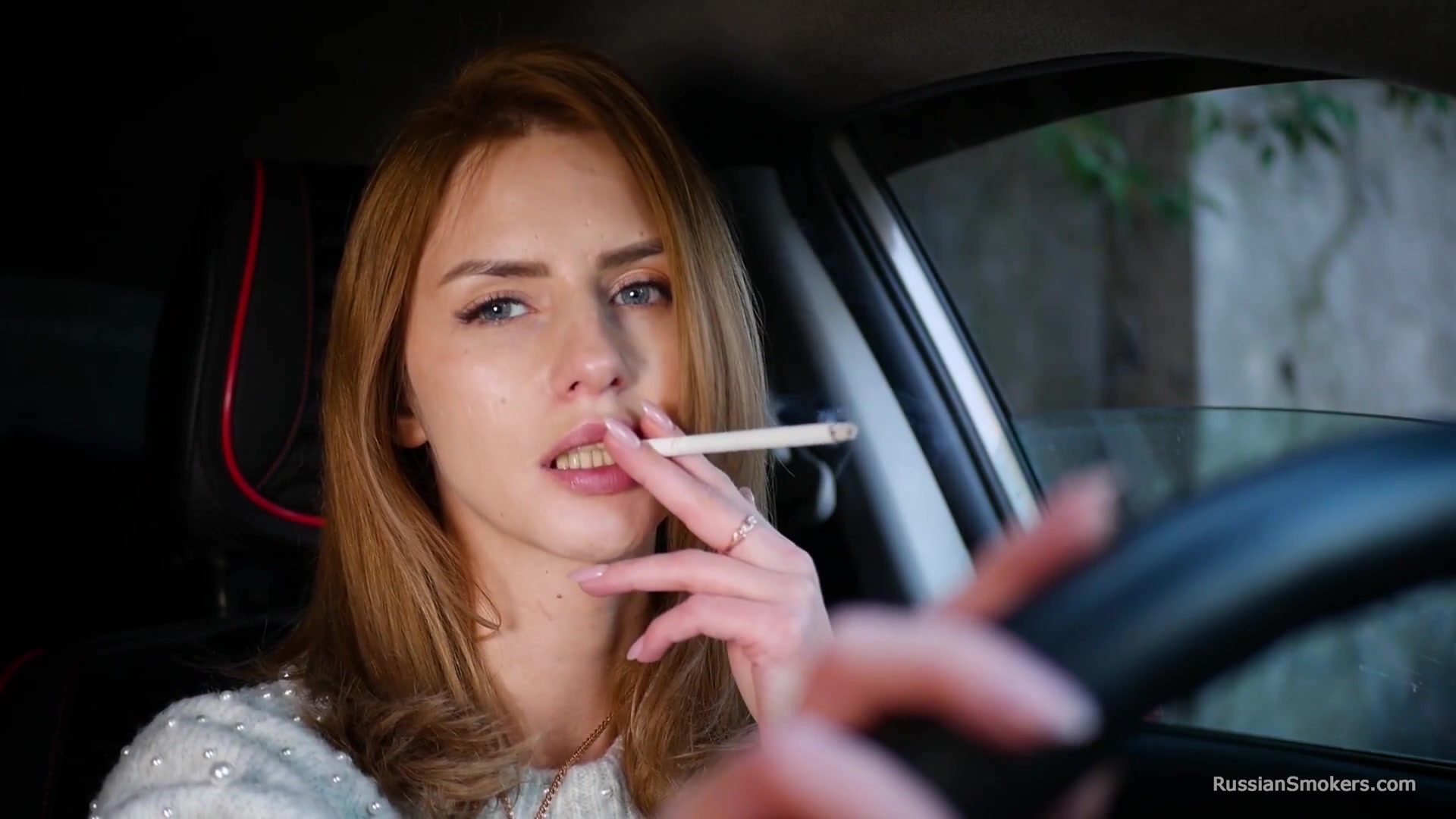 Meet Anastasia In Her Car While She Is Smoking Two 120mm All White Cigarettes