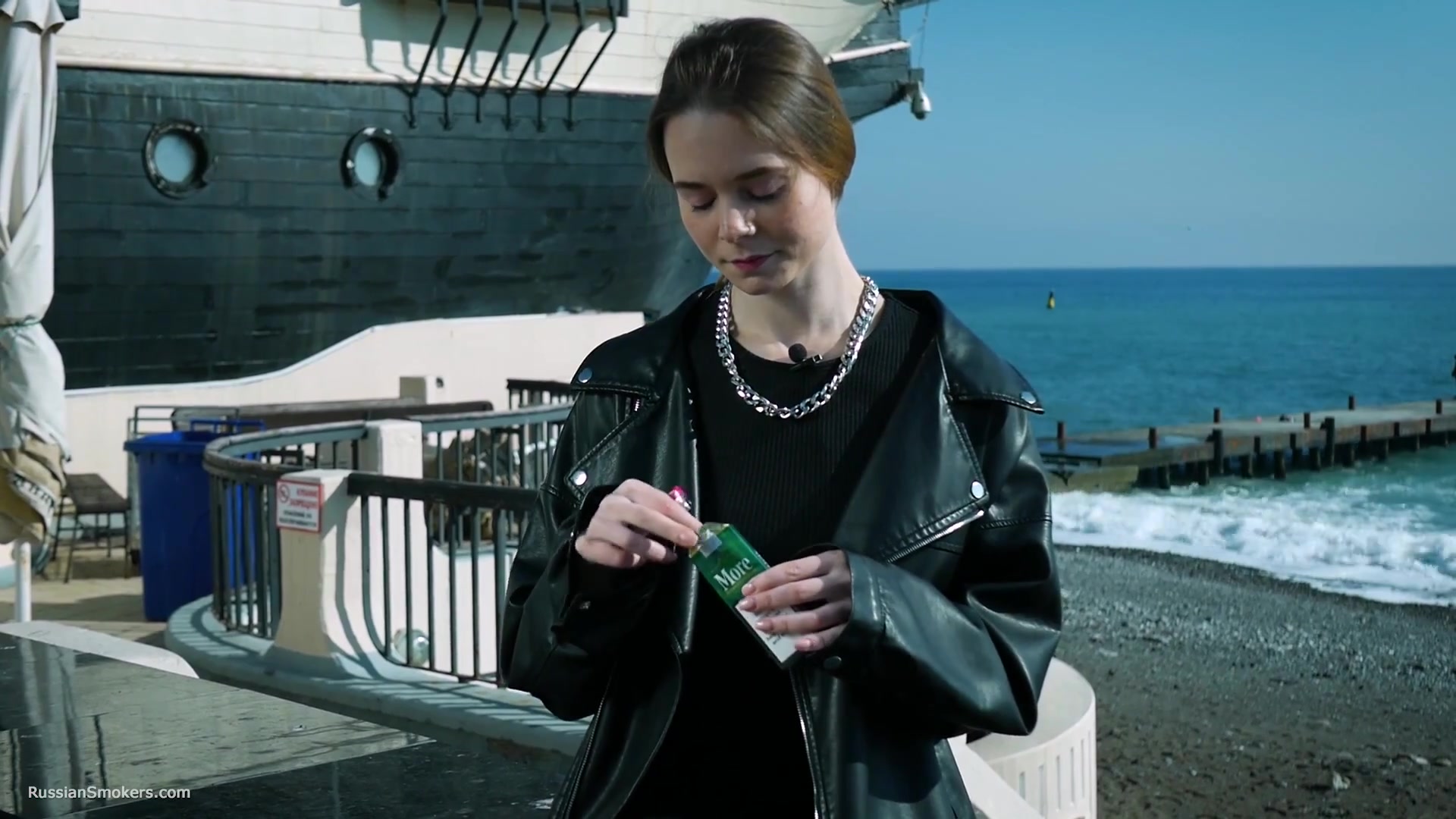 Smoking Strong Brown 120mm Cigarette Near The Beach