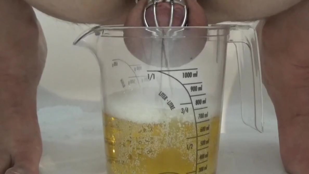 Old Clip From 2017: Pissing In Chastity Cage