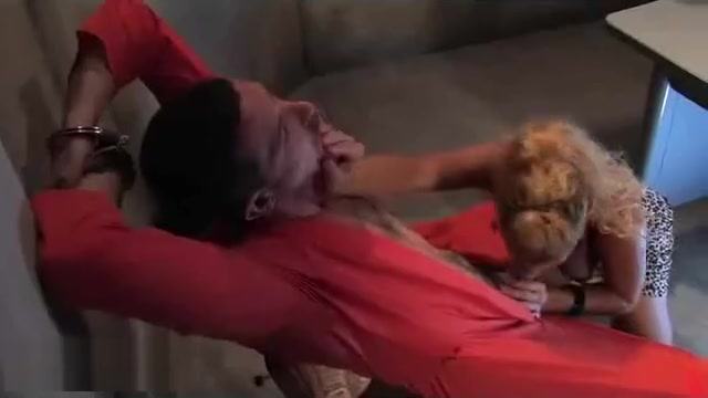 Tranny fucks guy in interrogation cell from behind