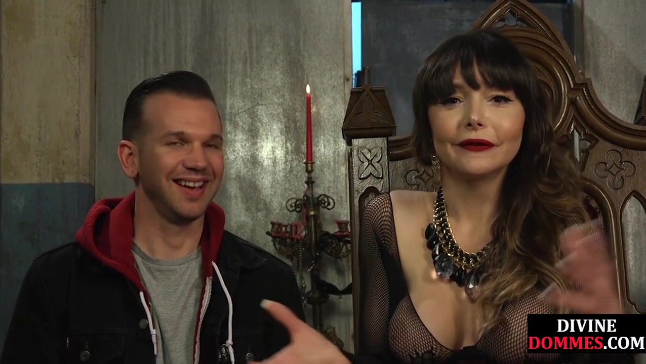 BDSM mature tattooed domina pegs sub asshole with strapon