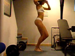 Strong lady is doing sport exercise without panties