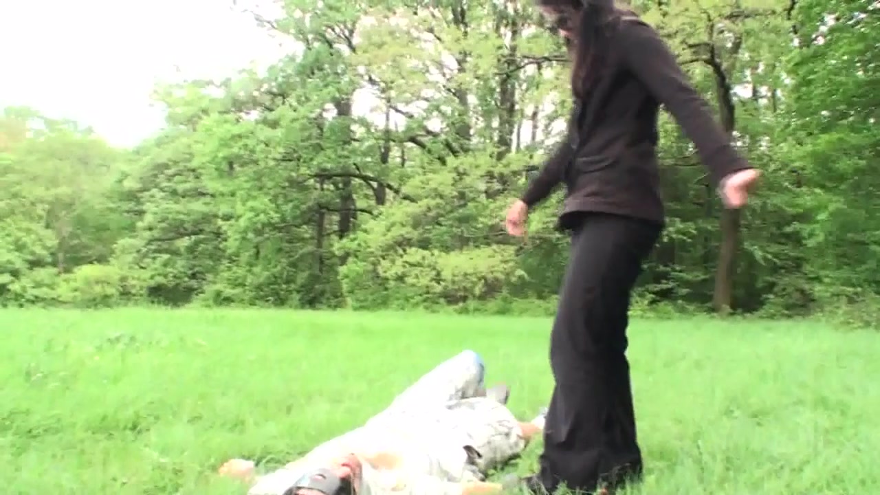 Outdoor trampling punishment with muddy shoes by Femdom Austria
