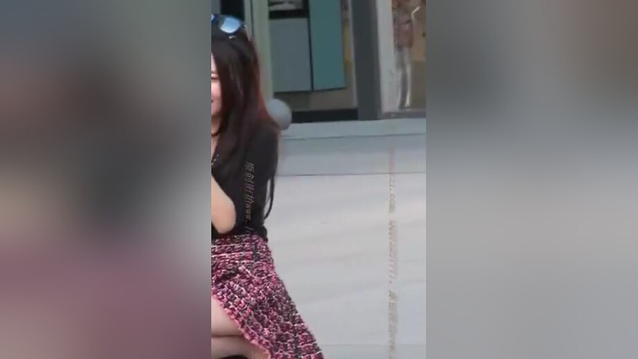 Chinese girl in short skirt