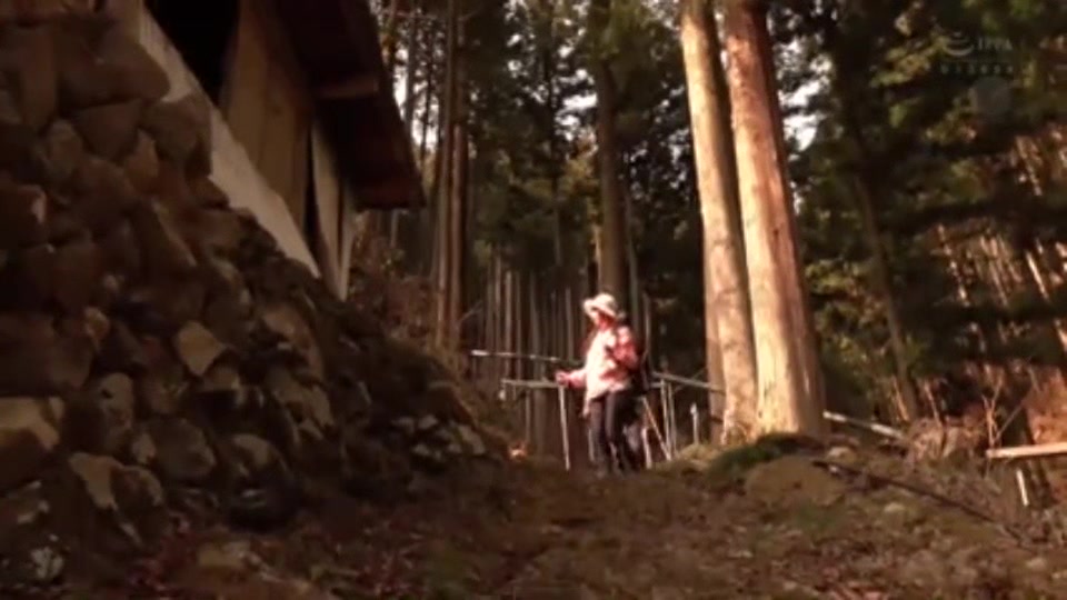 05648 Mature woman in a mountain hut
