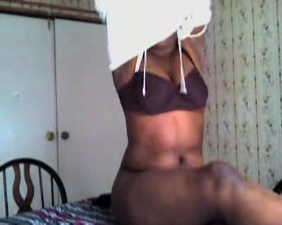 Black girl shows her sweet chocolate skin for the camera