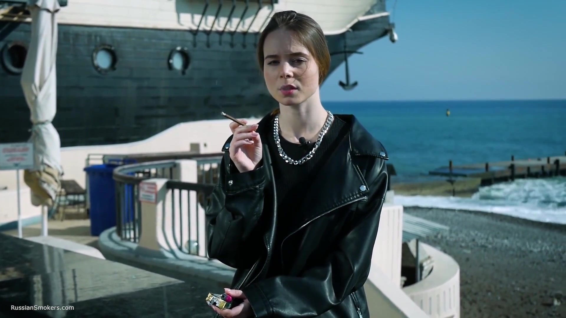 Smoking Strong Brown 120mm Cigarette Near The Beach
