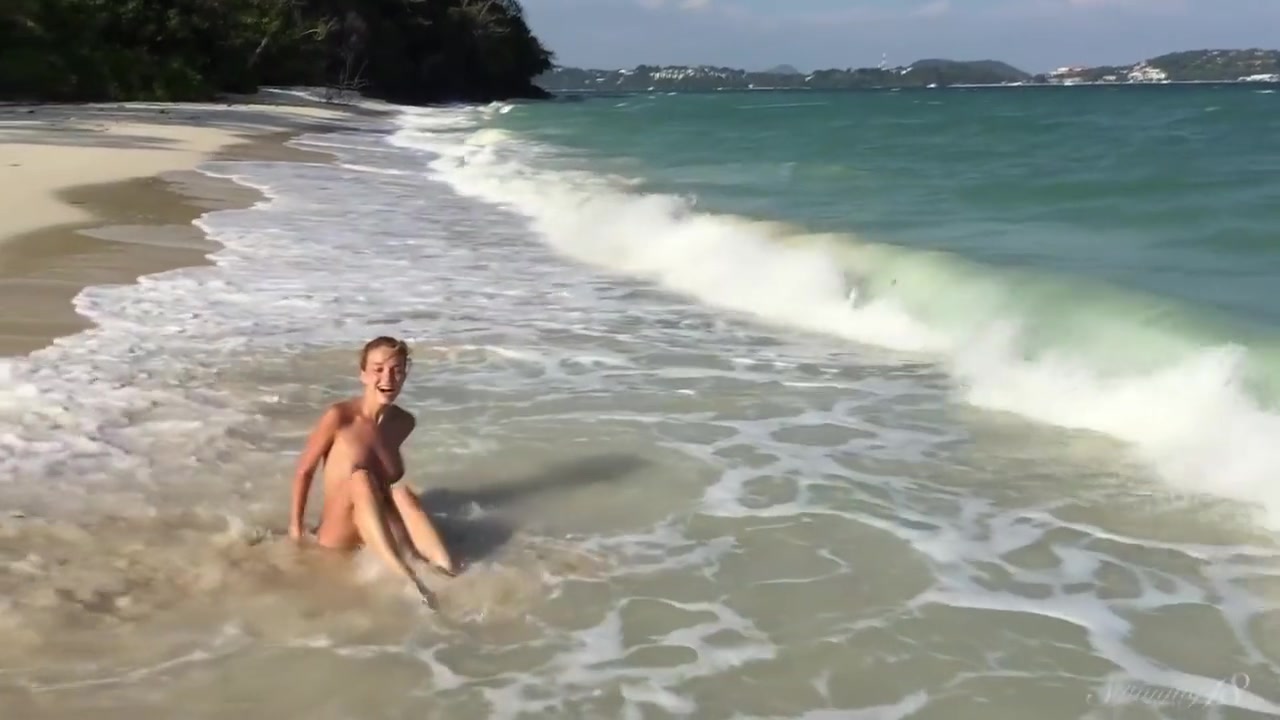 Divine Blonde With Large Breasts Naked At The Beach