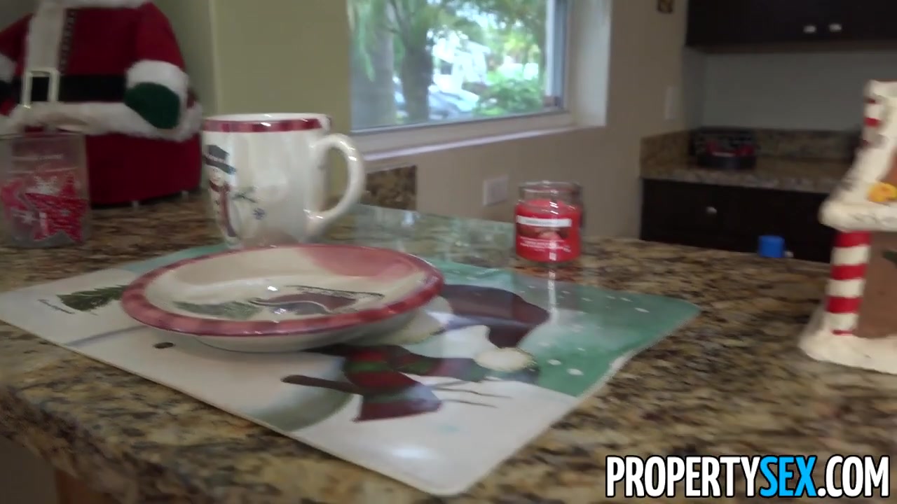 Busty real estate agent does naughty things for her Xmas bonus