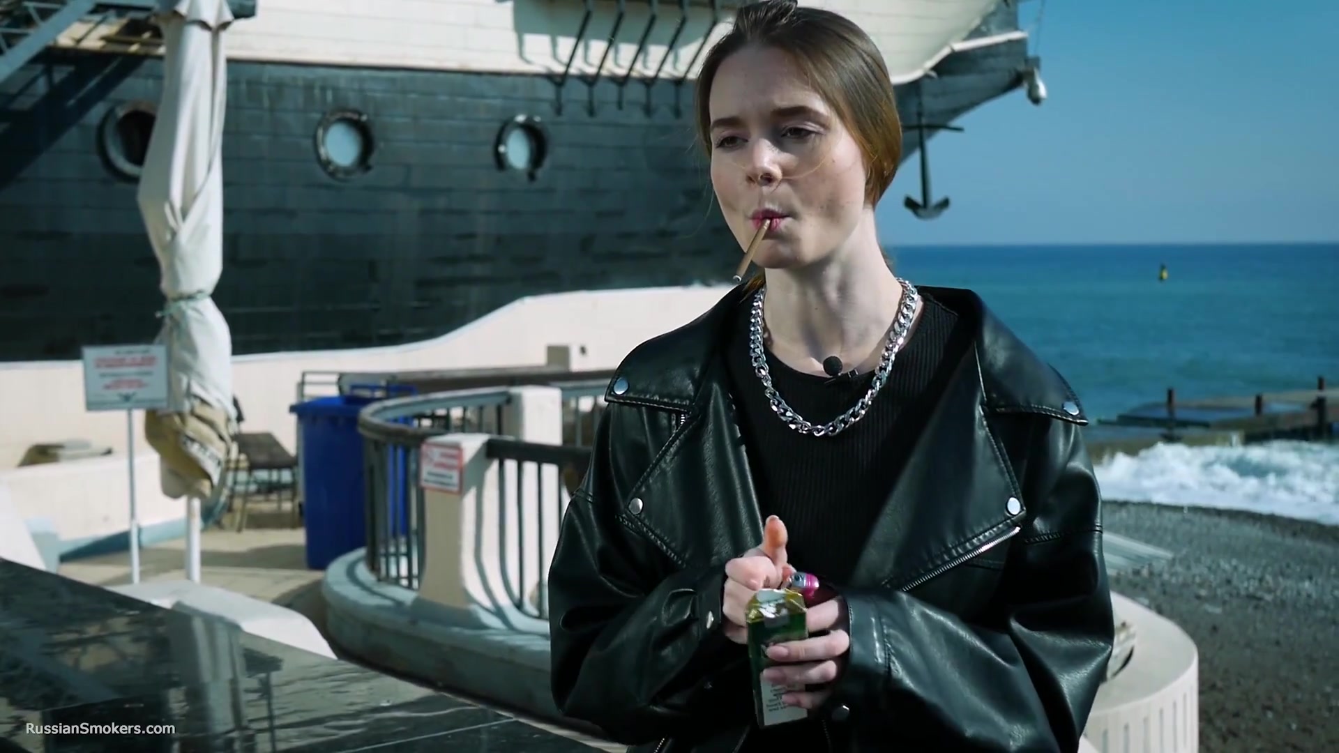 Smoking Strong Brown 120mm Cigarette Near The Beach