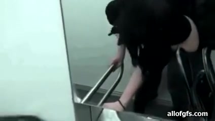 Raven haired girl sucks fucks in the wc