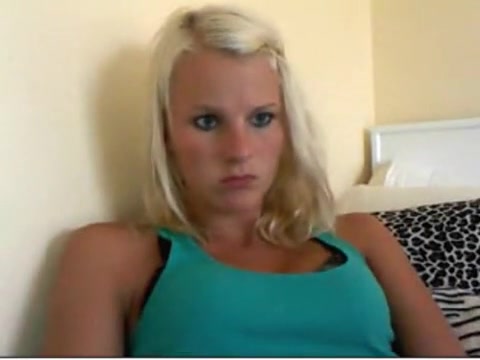 Blonde babe flashing her boobs and pussy on webcamera
