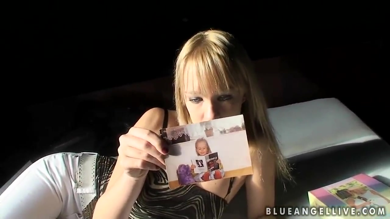 Blue Angel shows photo album in sexy outfit