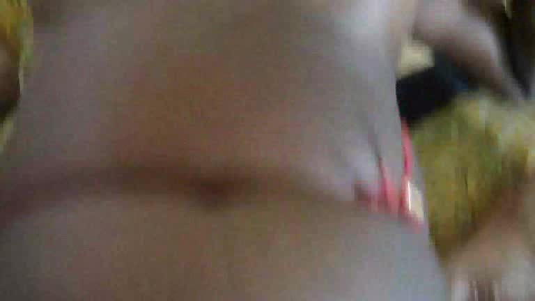 Black skinned girl has something inside her pussy