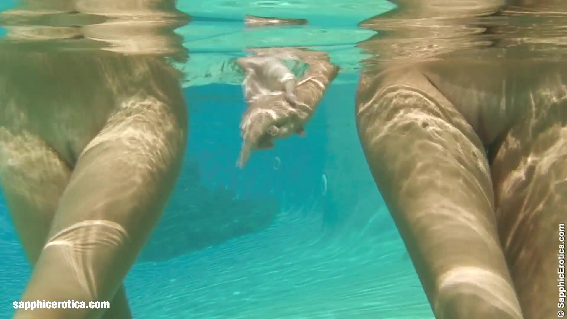 Billy and Jaquelin from Sapphic Erotica have lesbian sex in the pool