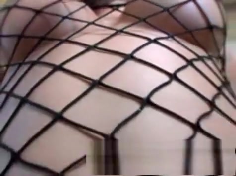 blonde tgirl In Fishnet Has A throbbing cock