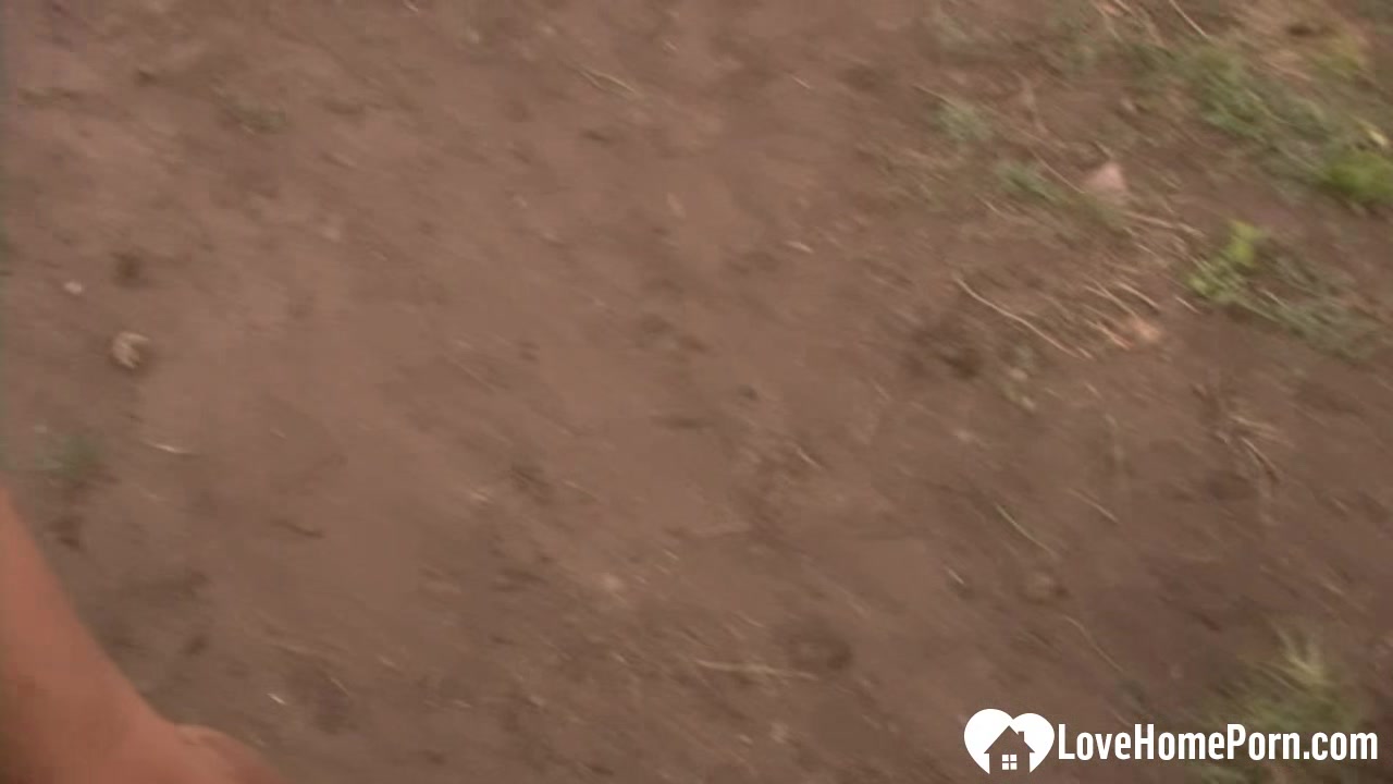 Horny slut plays with herself while outdoors