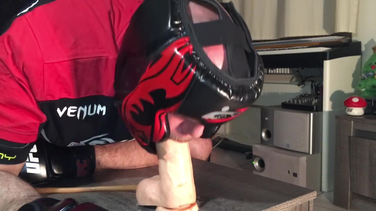 Playing With Inflatable Dildo In Full Boxing Gear