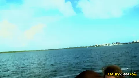 Courtney Cummz rides on Jmac on the boat