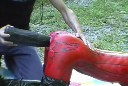 Butt toying in latex during a hike in the nature