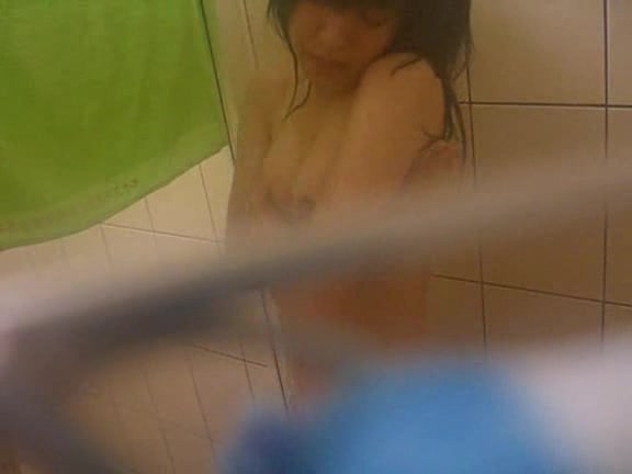Young Asian babe caught naked in the bathroom by horny