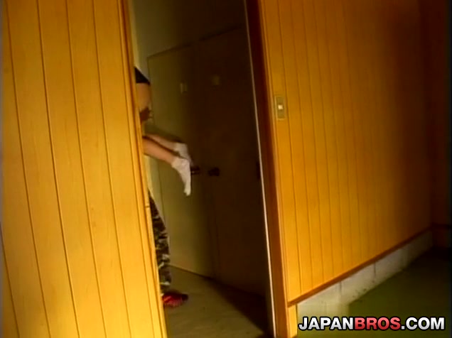 Nice Japanese nymphet has hands tied outdoor