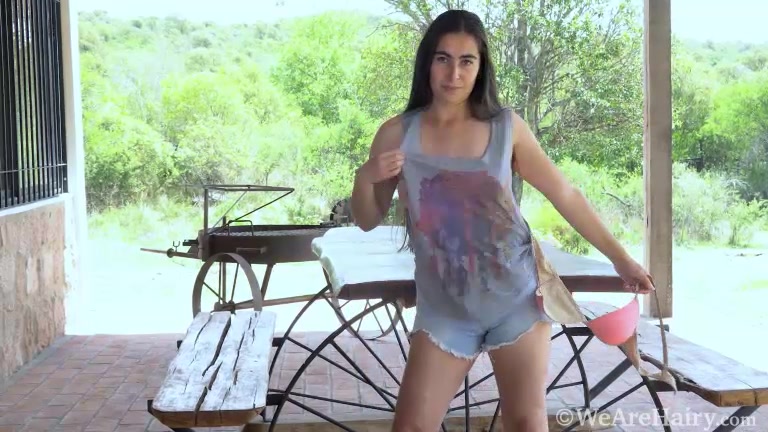 Paris masturbates outdoors on her patio
