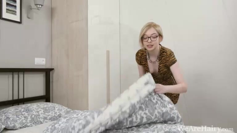 Abby masturbates with her glass toy in bed - WeAreHairy