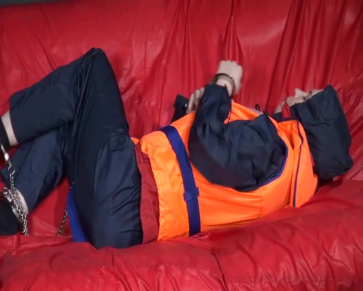 Get 3 Archive Videos With Nice Young Women Enjoying Bondage In Shiny Nylon Rainwear From 2008.