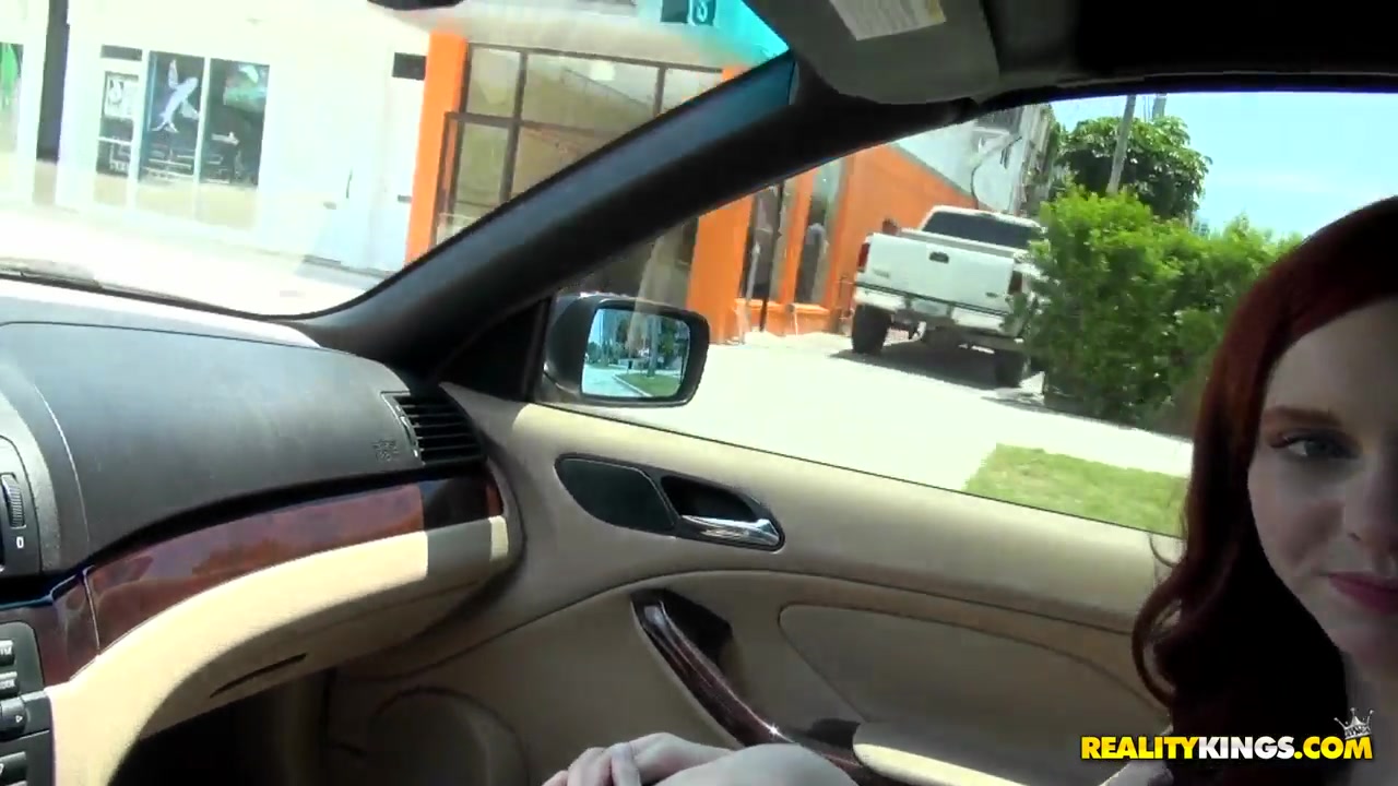 Redhead horny babe Ginger Maxx gets huge dick in her mouth in the car