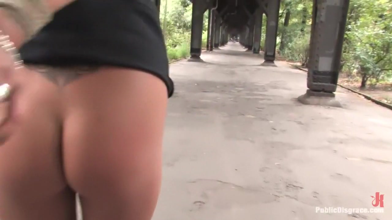 Euro babe gets tied up and exposed to a field of soccer players totally naked!!!