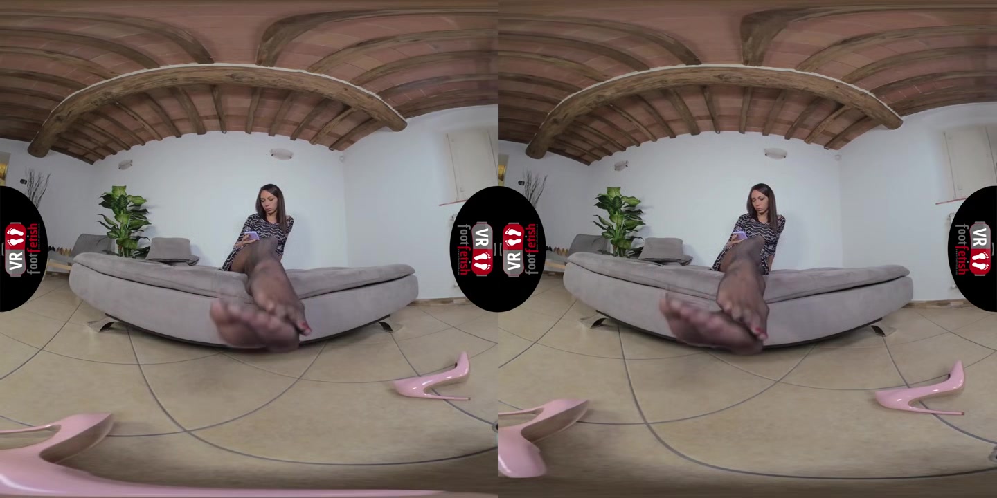 Stunningly Beautiful Daniela Lets Her Pink Stilettos Dangle Off Her Feet - VRFootFetish