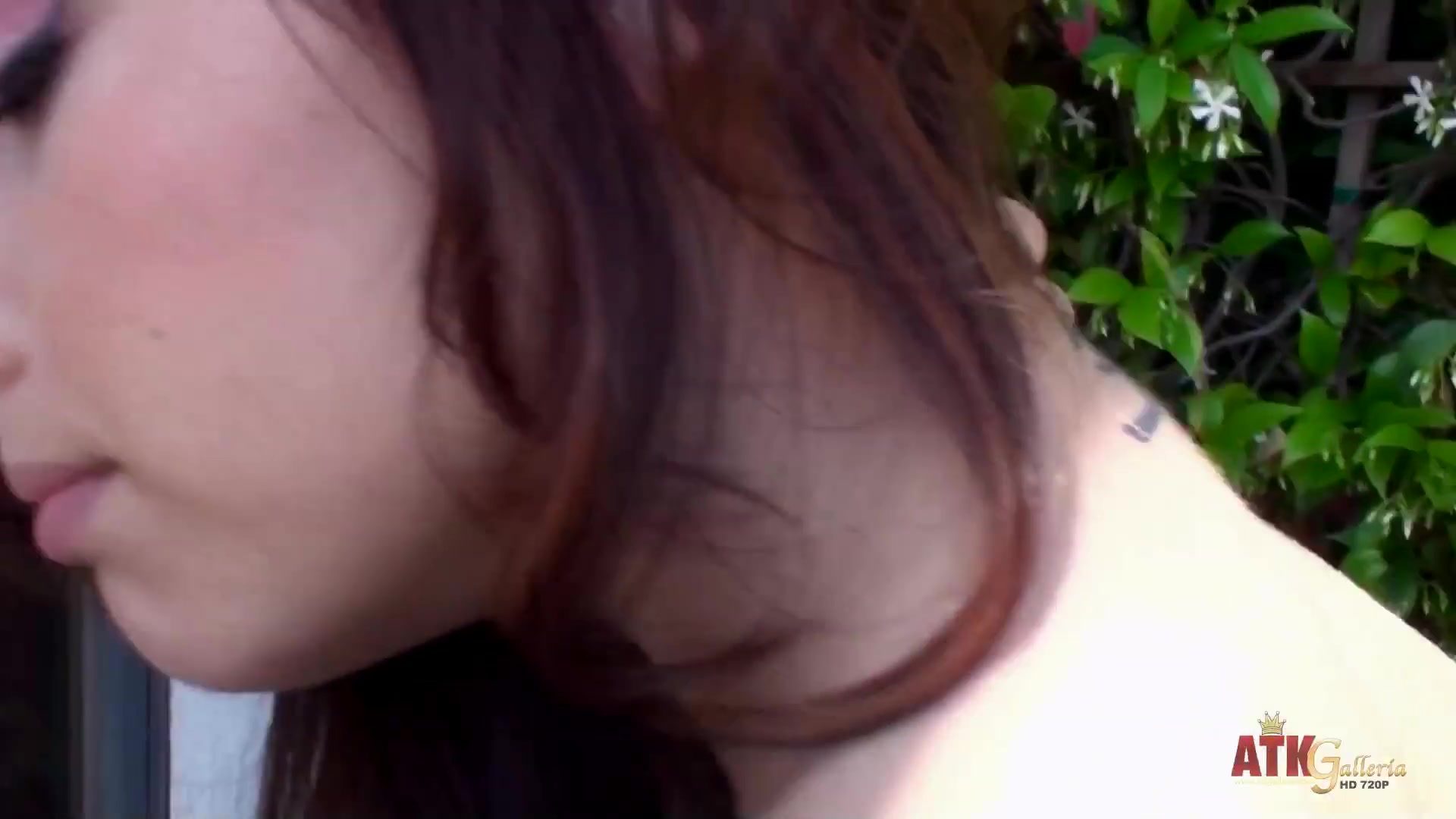 Sweet Maryjane Johnson smoking a cigarette and showing her small tits